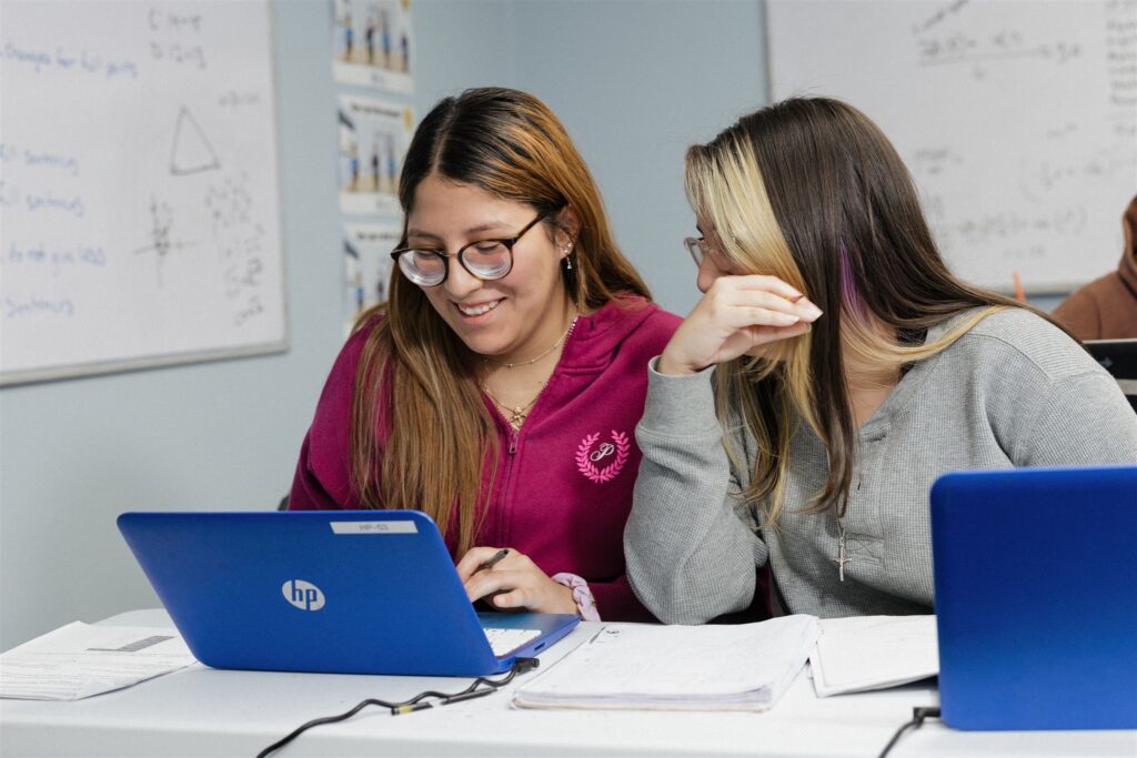 Two students working together.